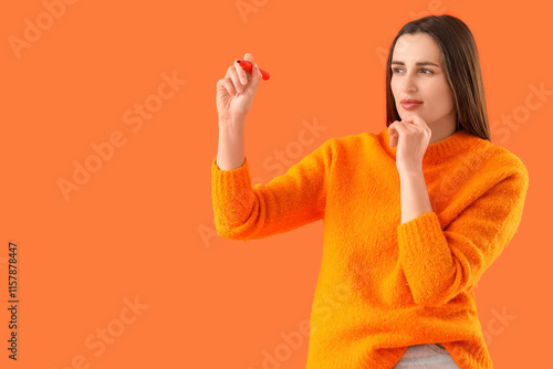 Wondering young woman with ...