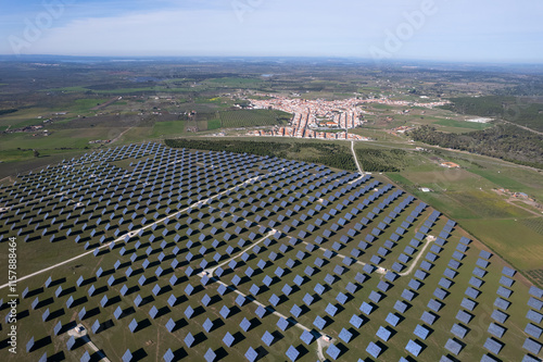 Aerial view of solar panels stretching across Alentejo,Portugal. Sustainable resource concept capturing renewable energy. Photovoltaic power generation, greem energie. photo