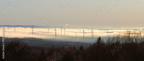 Sea of clouds in the wind farm over paderborn photo