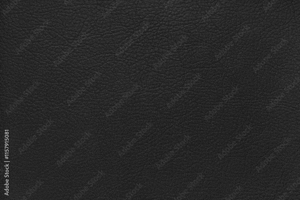 Fototapeta premium Natural, genuine solid black leather texture close up, macro. Structure of matte leatherette, artifical skin surface with embossing pattern. Background, wallpaper, backdrop