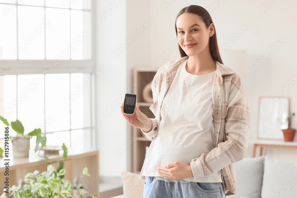 Young pregnant woman with gestational diabetes and glucometer at home Young pregnant woman with gestational diabetes and glucometer at home