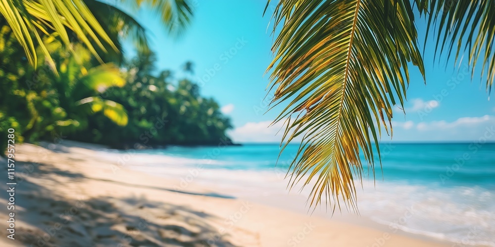 Obraz premium A captivating tropical beach scene featuring crystal-clear waters framed by lush palm trees under blue skies.
