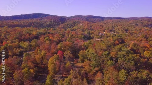 Aerial flyover of autumn colors in the Hudson River Valley of upstate New York photo