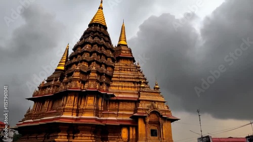 Magnificent Golden Temple under Stormy Skies photo