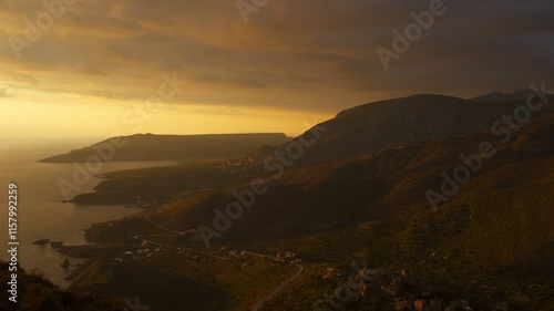 Mani Peninsula with coastal villages at sunset in Greece photo