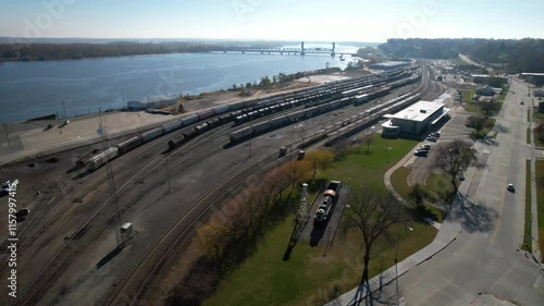 IOWA - 12.5.2024 - Fantastic aerial footage moving over a freight yard by the Mississippi River. photo