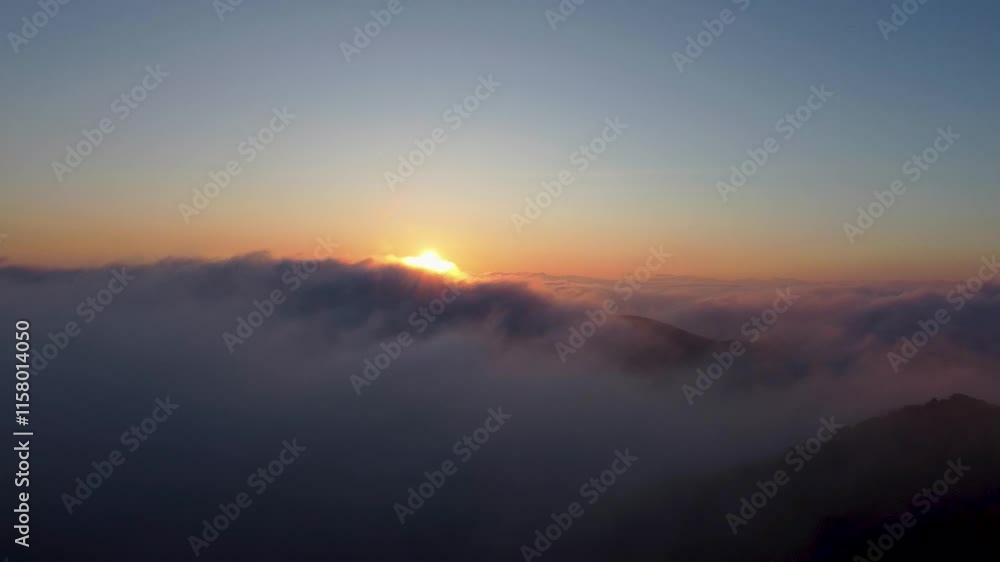 Cloudy and Foggy Mountain Sunrise Cloudy and Foggy Mountain Sunrise