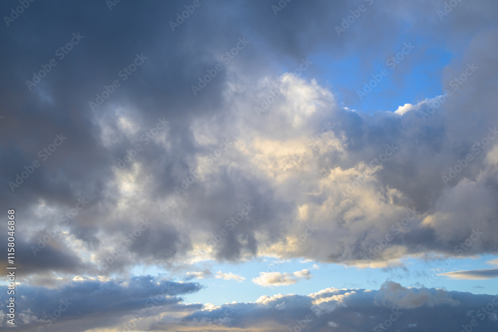 Sky with gray white clouds and blue sky horizontally during the day Sky with gray white clouds and blue sky horizontally during the day