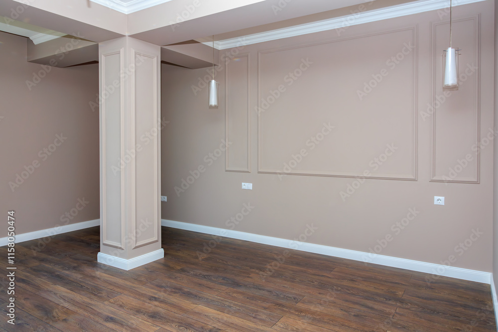 Fototapeta premium A large empty room with a wooden floor and a white wall