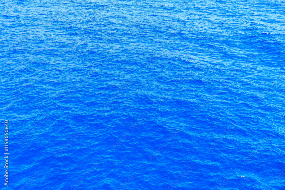 Fototapeta premium The image is of a large body of water with a blue color