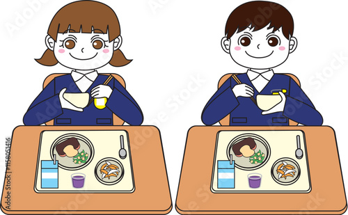 給食を食べる小学生の男女