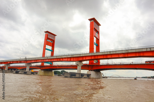 The red Ampera Bridge in Palembang City, South Sumatra, over the Musi River