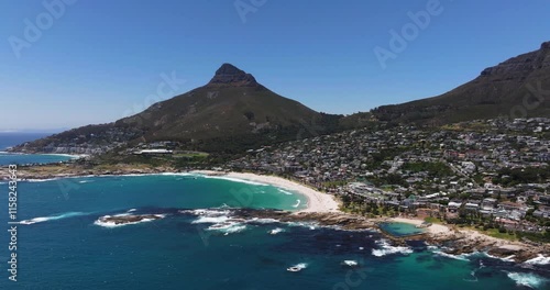 Wide Aerial View Above Camps Bay Beach, Lion's Head Mountain in Background