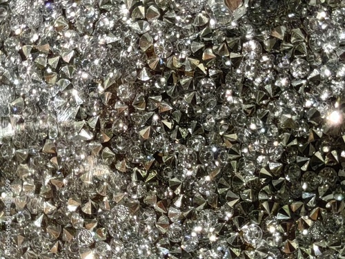 Sparkling gray crystals, lights in focus and out of focus. Wallpaper, background.  photo