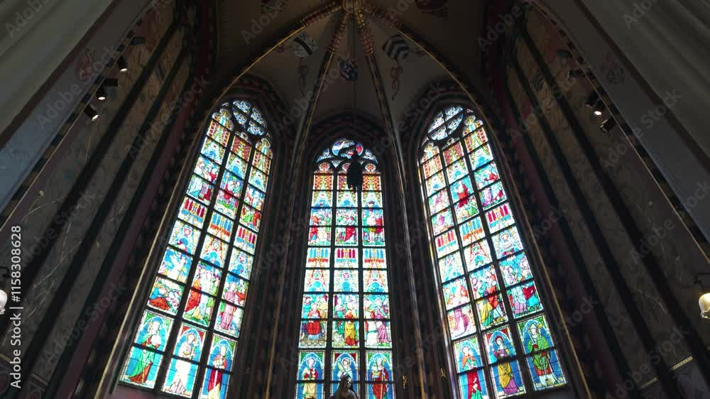 Ornate stained glass windows and vaulted ceiling in the Cathedral of Our Lady, Antwerp Ornate stained glass windows and vaulted ceiling in the Cathedral of Our Lady, Antwerp
