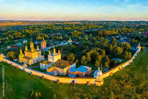 Pereslavl-Zalessky, Russian. Watercolor illustration. Goritsky Assumption Monastery at sunset. Aerial view photo