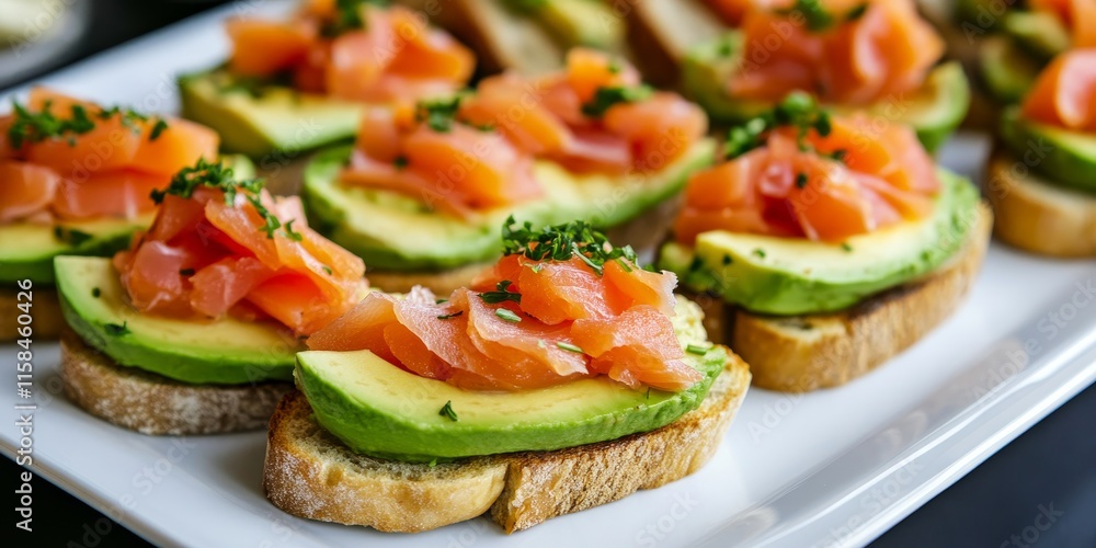Avocado and smoked salmon toasts elegantly arranged on a white plate, showcasing the delightful combination of flavors in these delicious toasts, perfect for any gourmet occasion. Avocado and smoked salmon toasts elegantly arranged on a white plate, showcasing the delightful combination of flavors in these delicious toasts, perfect for any gourmet occasion.