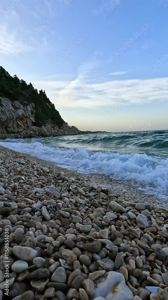 Morning surf breaks the coastline. Croatia, Adriatic Sea