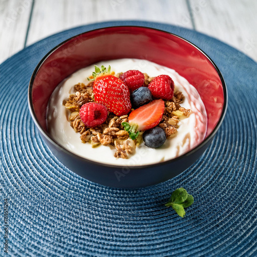 Vibrant Fromage Blanc Bowl with Fresh Red Fruits photo