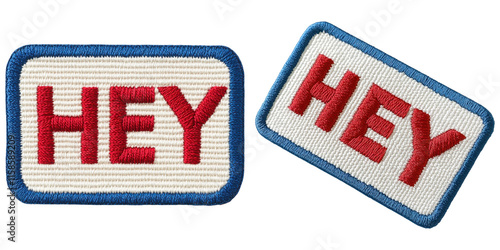 Wallpaper Mural Two embroidered patches featuring the word "HEY" in bold red letters on a white background with blue borders. Torontodigital.ca