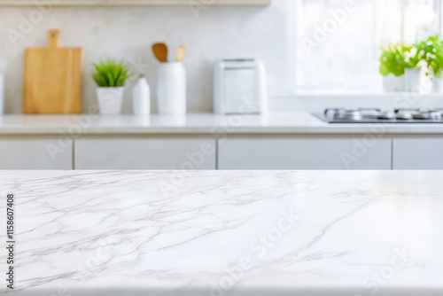 Empty marble tabletop in a blurred modern kitchen  for product placement