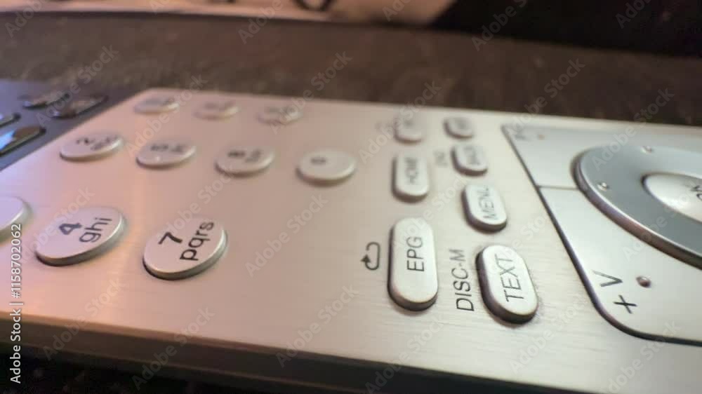 buttons of modern TV remote control in close up buttons of modern TV remote control in close up