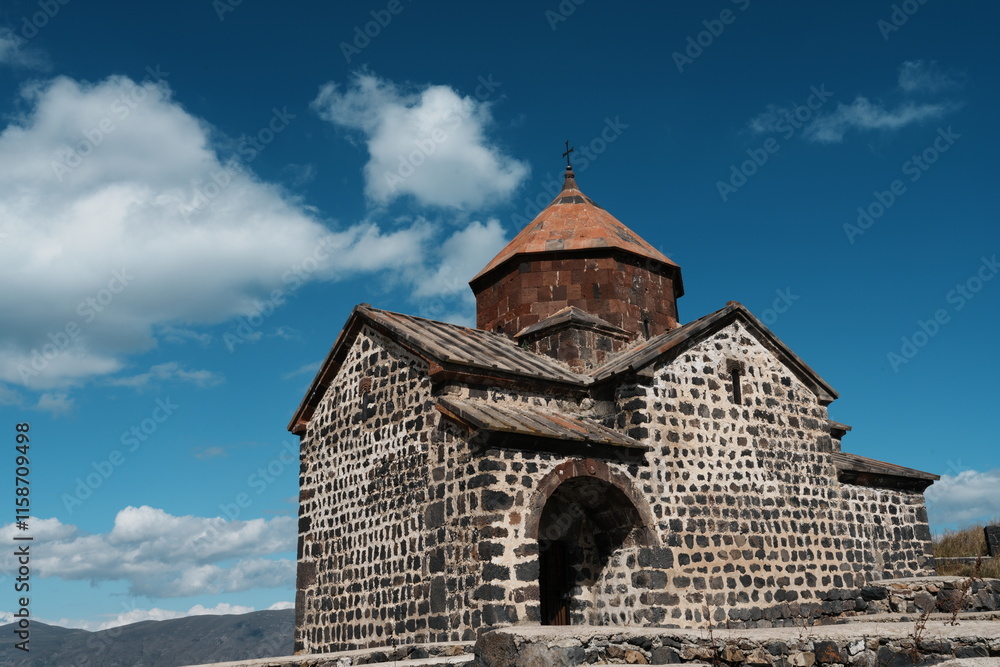 Fototapeta premium Lake Sevan: the largest freshwater high-altitude lake in Eurasia; Sevanavank: a monastic complex located on a peninsula at the northwestern shore of Lake Sevan; 