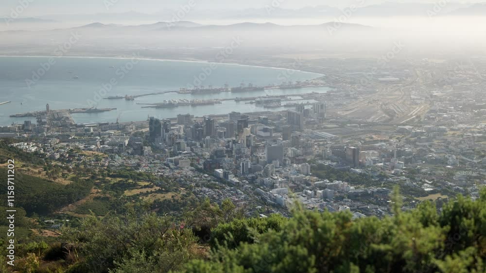 Aerial view showing Cape Town with ocean from Lions Head. Top down shot. Beautiful landscape with beach in South Africa. Aerial view showing Cape Town with ocean from Lions Head. Top down shot. Beautiful landscape with beach in South Africa.