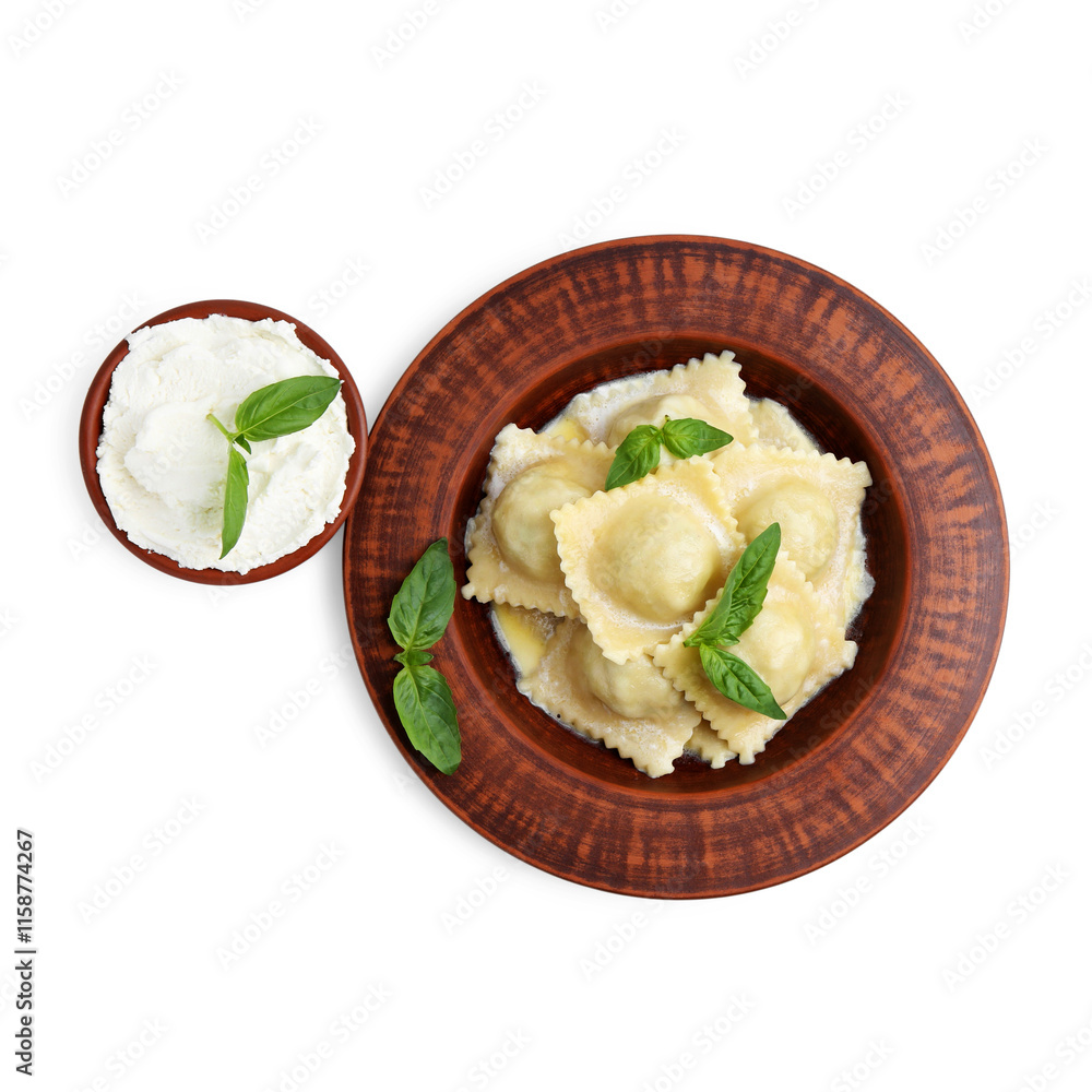 Delicious ravioli with cheese and basil in bowl isolated on white, top view Delicious ravioli with cheese and basil in bowl isolated on white, top view