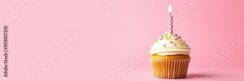 Wallpaper Mural Brightly decorated cupcake with a candle on top set against a soft pink background for a celebration Torontodigital.ca