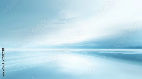 Abstract winter landscape with blurred light blue background and soft, dreamy atmosphere. The snowfield ahead is out of focus, creating depth and an ethereal, tranquil scene for winter-themed designs.