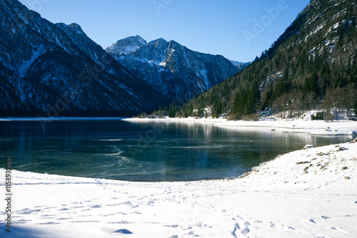 Vista del Lago del Predil con montagne sullo sfondo, Tarvisio, Cave del Predil, Italia photo