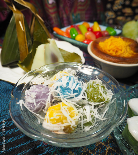 Thai Coconut Rice Ball Dessert on Vibrant Fabric 
Fluffy cupcakes 3