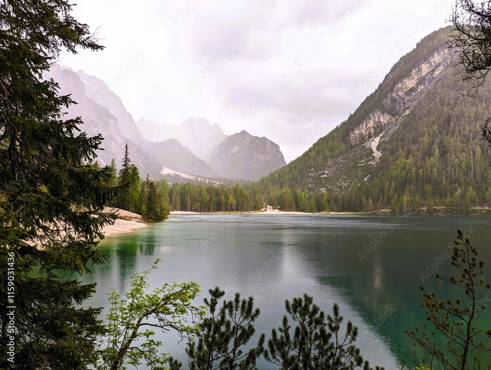 Naklejka premium Beautiful landscape panorama of the Pragser Wildsee, Lake Prags, Lake Braies, Lago di Braies, Pragser Wildsee in the Dolomites in South Tyrol, Italy. Hiking and holidays in South Tyrol.