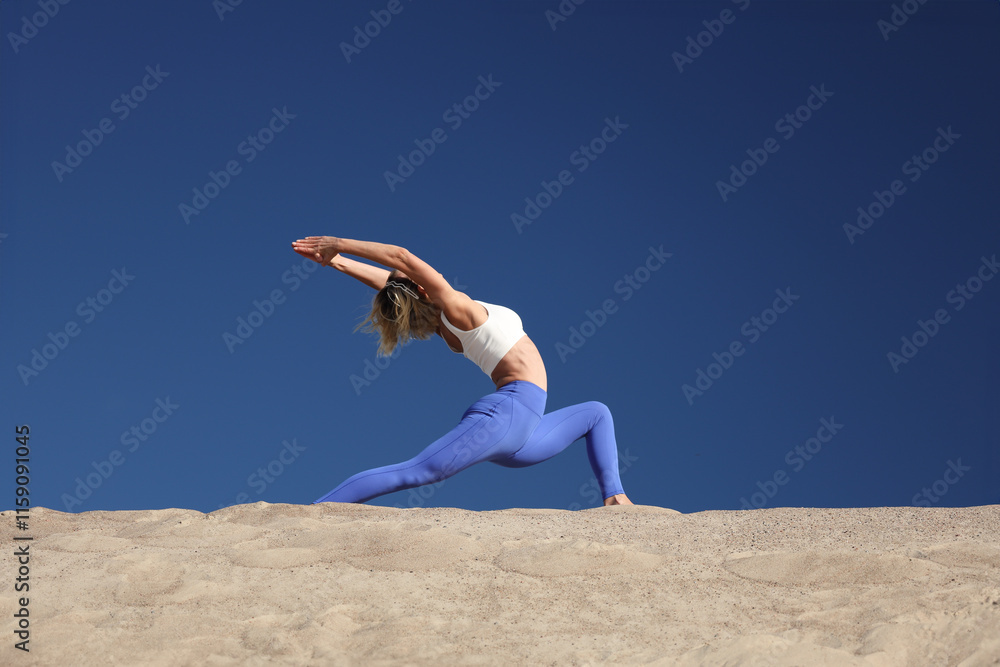 Young sporty woman practicing yoga Young sporty woman practicing yoga