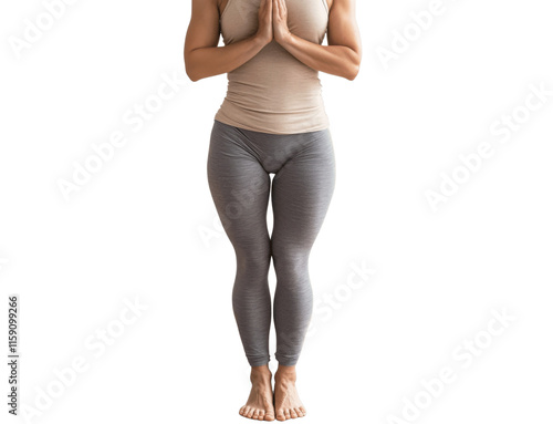 A person practicing yoga in a standing tree pose, hands together in a prayer position, centered on a white background with a balanced and serene look photo