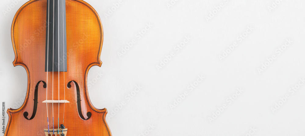 Close up of violin with glowing wood textures on white background Close up of violin with glowing wood textures on white background