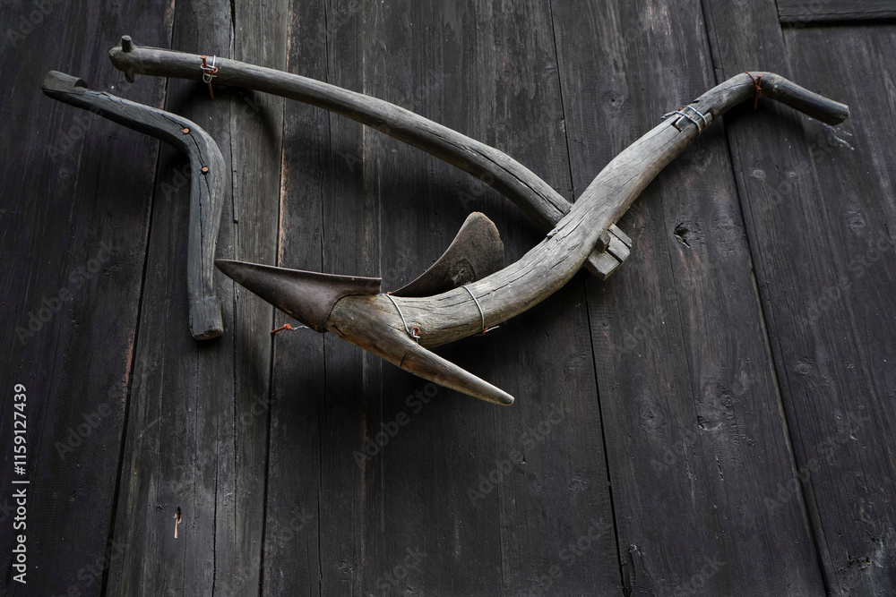 Agricultural tools on Dong people's houses in China Ethnic Museum.