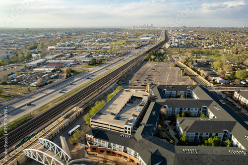 Aerial View of Englewood Colorado Urban Landscape with Highway and Residential Complex at Sunset and view of Denver
