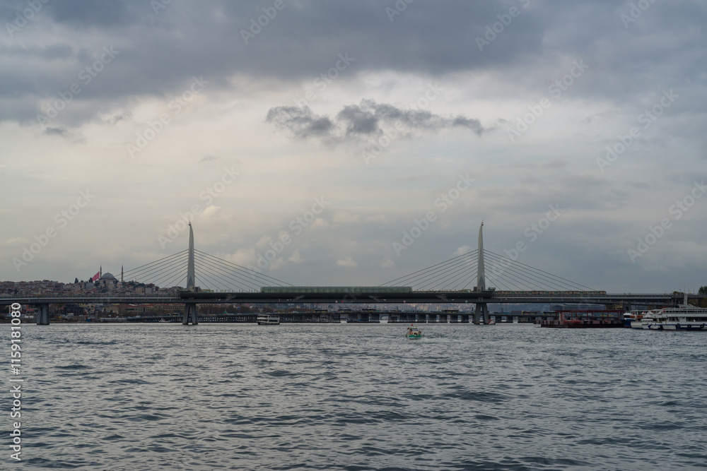 View of the Metro Bridge, railway and pedestrian bridge spanning the Golden Horn in Azapkapi, Istanbul View of the Metro Bridge, railway and pedestrian bridge spanning the Golden Horn in Azapkapi, Istanbul