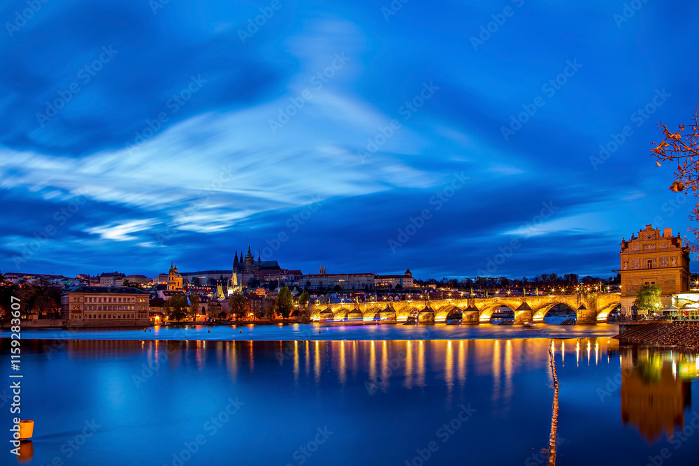 Fototapeta premium Panoramic view of Prague Castle and St. Vitus Cathedral over the Vltava River in Prague, Czech Republic.