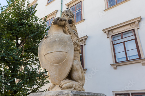 Lion sculpture before the Swiss Gate of Hofburg, Vienna photo