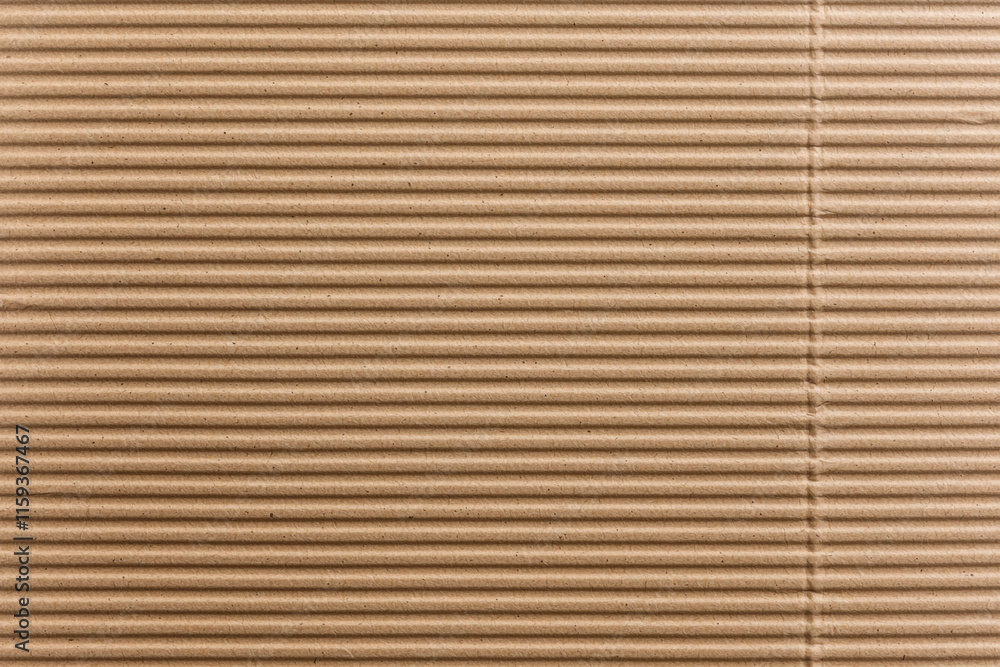 Textured brown cardboard with horizontal lines, ideal for backgrounds Textured brown cardboard with horizontal lines, ideal for backgrounds