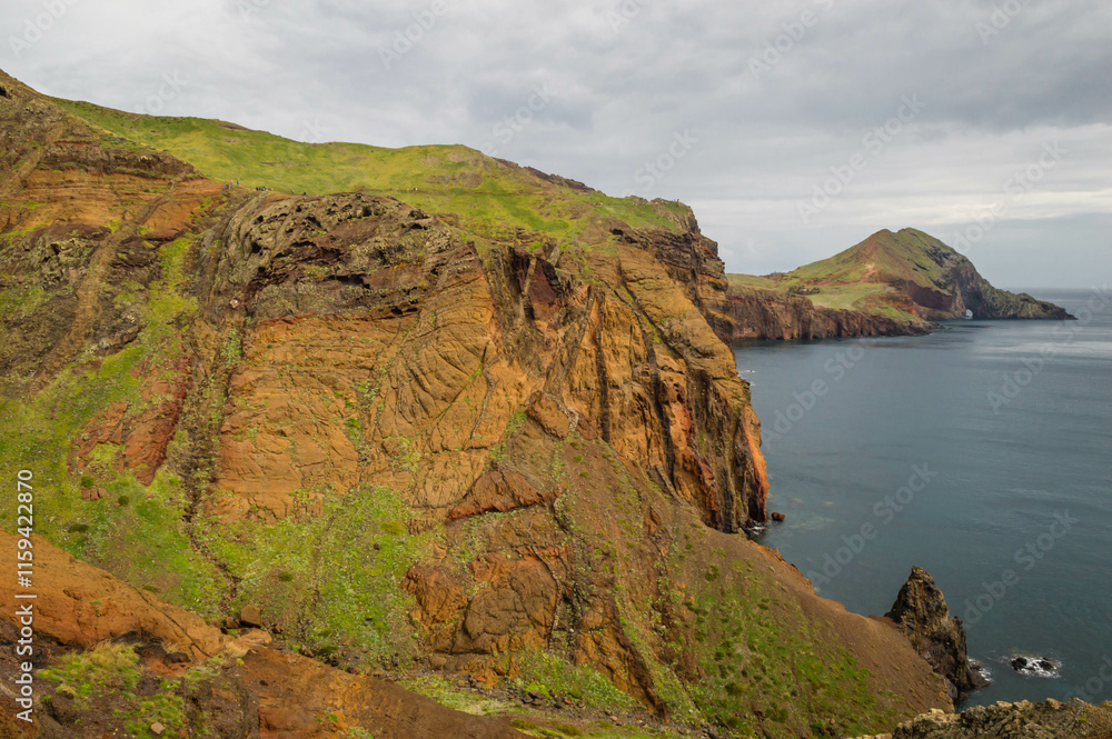 The majestic cliffs surrounded by blue waters. Vereda da Ponta de Sao Lourenco, Madeira, Portugal The majestic cliffs surrounded by blue waters. Vereda da Ponta de Sao Lourenco, Madeira, Portugal