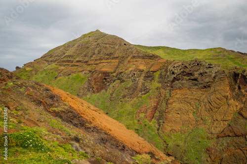 The majestic cliffs surrounded by blue waters. Vereda da Ponta de Sao Lourenco, Madeira, Portugal