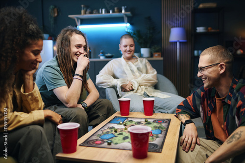 Photography Group of friends having fun during game at home party