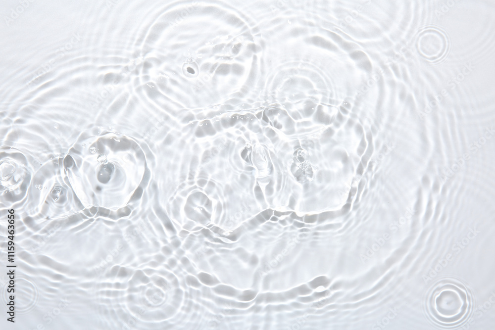 Rippled surface of clear water on white background, top view Rippled surface of clear water on white background, top view