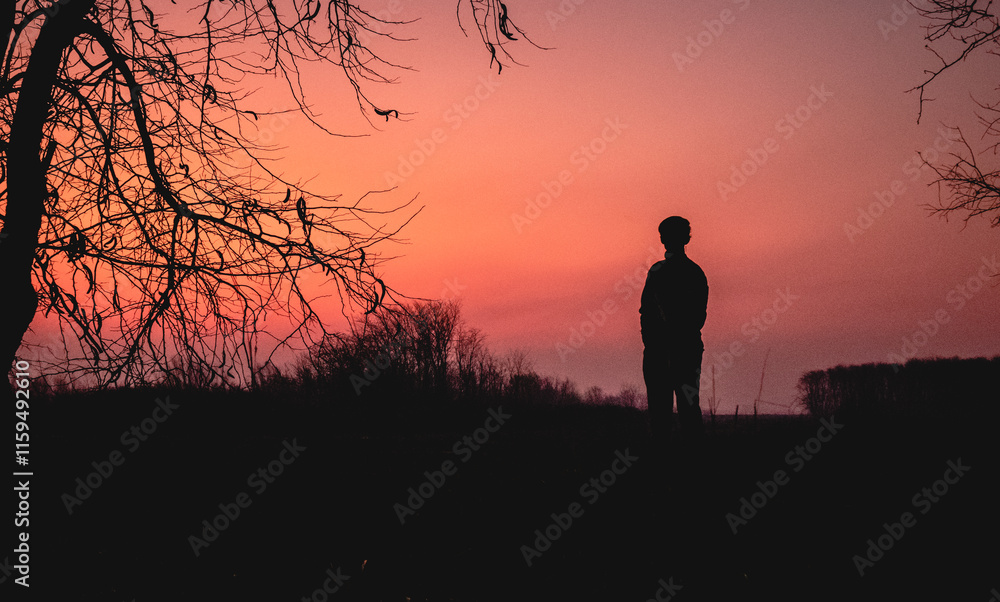Beautifull sunset in peri-urban ambience with a person on it, Argentina. Beautifull sunset in peri-urban ambience with a person on it, Argentina.