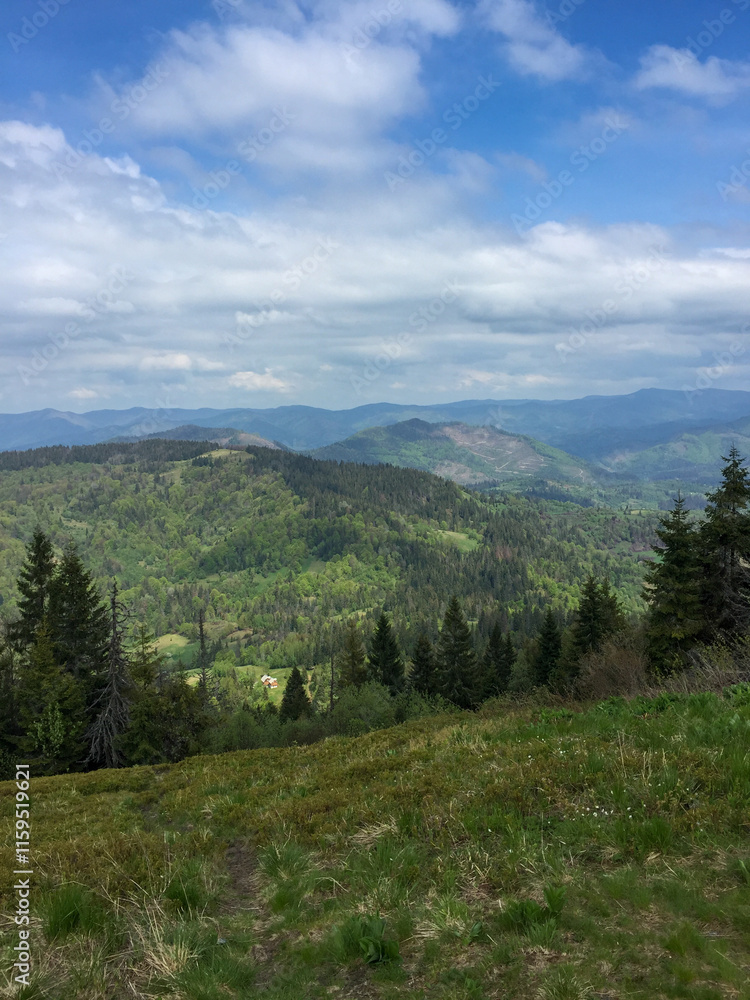 Lush mountain scenery with clouds Lush mountain scenery with clouds