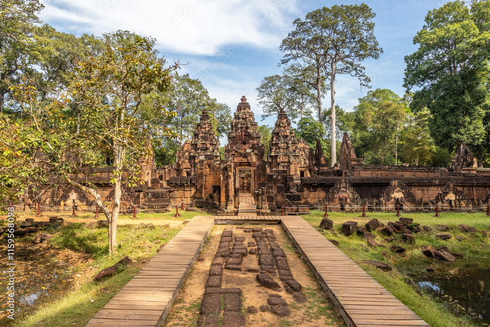 Hidden in jungles hindu Banteay Srei khmer ruined temple entrance, Angkor Archaeological Park, Siem Reap, Cambodia Hidden in jungles hindu Banteay Srei khmer ruined temple entrance, Angkor Archaeological Park, Siem Reap, Cambodia